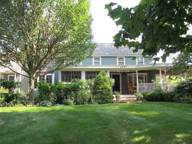 4251 Terpening Rd, Harbor Springs, MI 49740 - view of front of home with a front yard