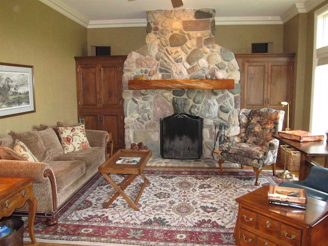 4251 Terpening Rd, Harbor Springs, MI 49740 - living area with ceiling fan, a fireplace, and ornamental molding