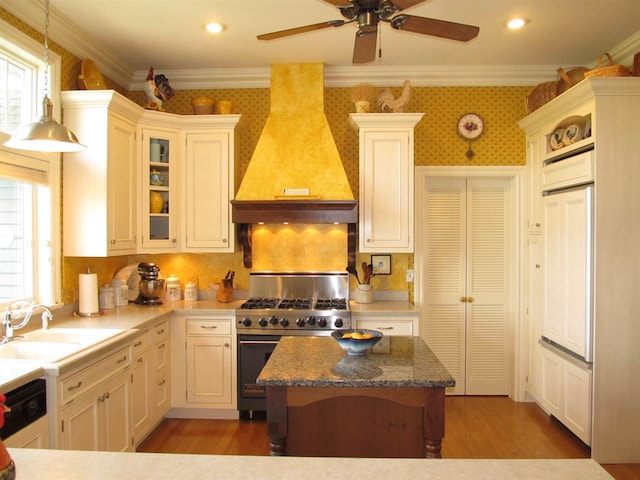 4251 Terpening Rd, Harbor Springs, MI 49740 - kitchen with crown molding, a ceiling fan, a sink, stainless steel gas range, and custom range hood