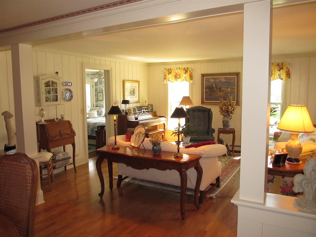 4251 Terpening Rd, Harbor Springs, MI 49740 - living area with wood finished floors, a wealth of natural light, and ornamental molding