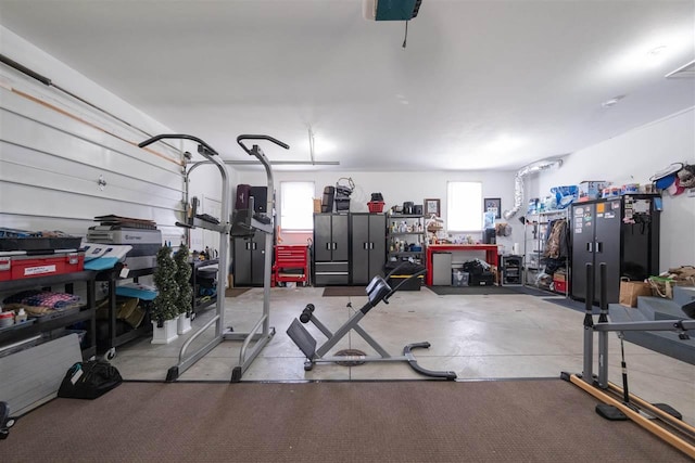 6001 N Silver Pines Dr, Bellaire, MI 49615 - garage with a garage door opener