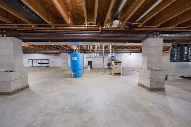 6001 N Silver Pines Dr, Bellaire, MI 49615 - unfinished below grade area featuring a heating unit