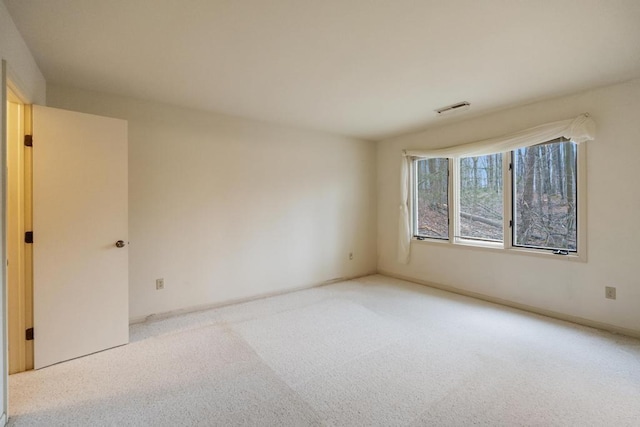 1871 Cherry Hill Ct, Harbor Springs, MI 49740 - carpeted empty room featuring visible vents