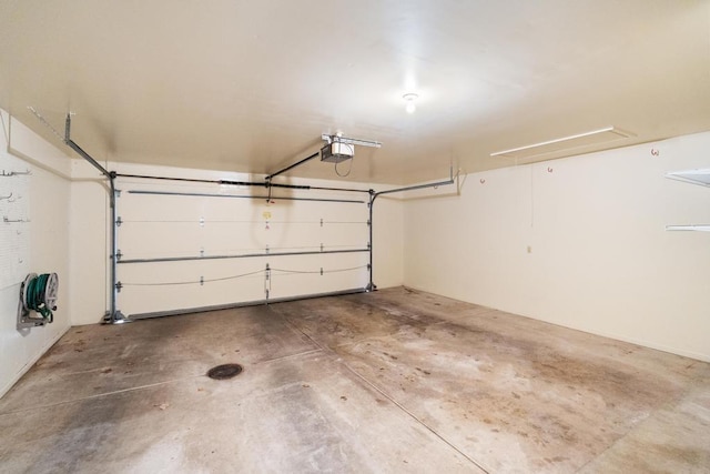 1871 Cherry Hill Ct, Harbor Springs, MI 49740 - garage featuring a garage door opener