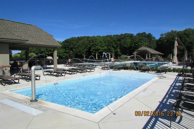 1871 Cherry Hill Ct, Harbor Springs, MI 49740 - community pool with a patio