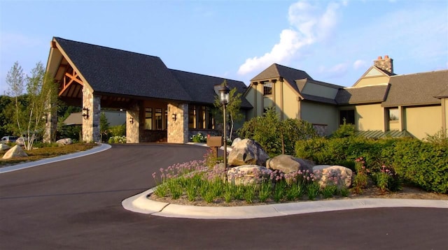 1871 Cherry Hill Ct, Harbor Springs, MI 49740 - view of front of home featuring stone siding