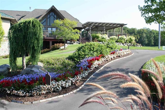 1871 Cherry Hill Ct, Harbor Springs, MI 49740 - view of home's community with a pergola and a yard