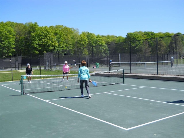 1871 Cherry Hill Ct, Harbor Springs, MI 49740 - view of tennis court with community basketball court and fence