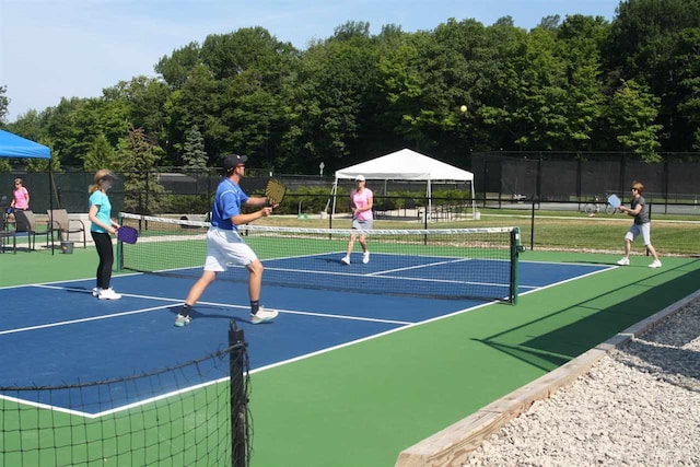 1871 Cherry Hill Ct, Harbor Springs, MI 49740 - view of tennis court with fence and community basketball court
