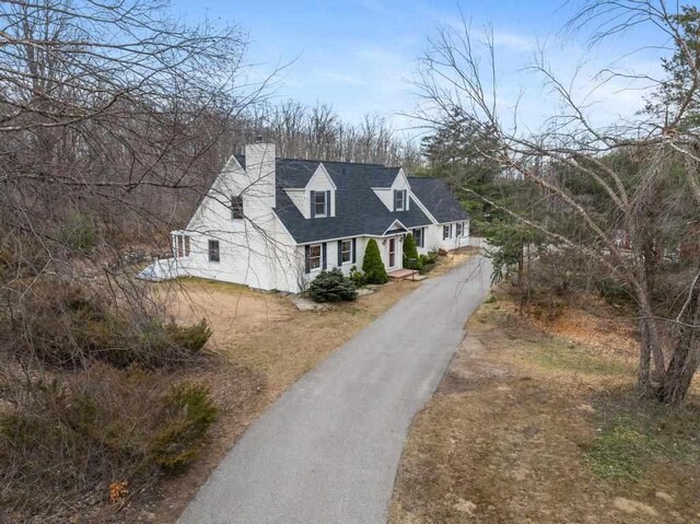 view of front of house with a chimney
