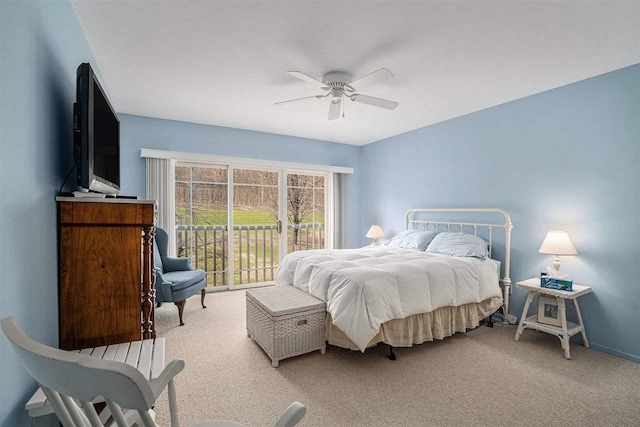 bedroom featuring baseboards, a ceiling fan, access to outside, and light colored carpet