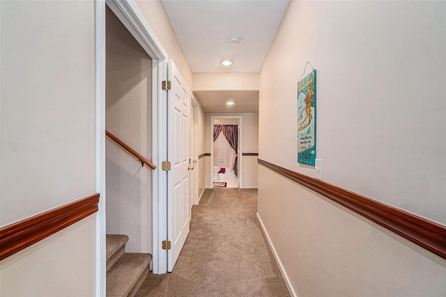 corridor featuring recessed lighting and carpet flooring