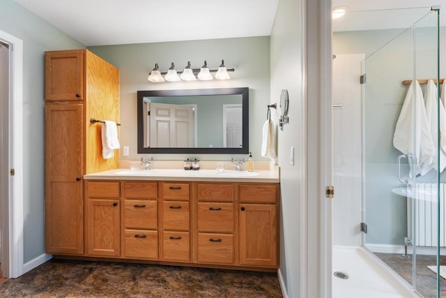 8913 Horseshoe Dr, Harbor Springs, MI 49740 - bathroom with double vanity, a shower stall, and a sink