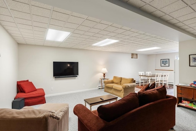 8913 Horseshoe Dr, Harbor Springs, MI 49740 - carpeted living area featuring baseboards, a baseboard radiator, and a drop ceiling