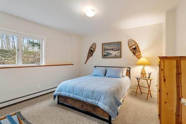 8913 Horseshoe Dr, Harbor Springs, MI 49740 - carpeted bedroom with baseboard heating and baseboards