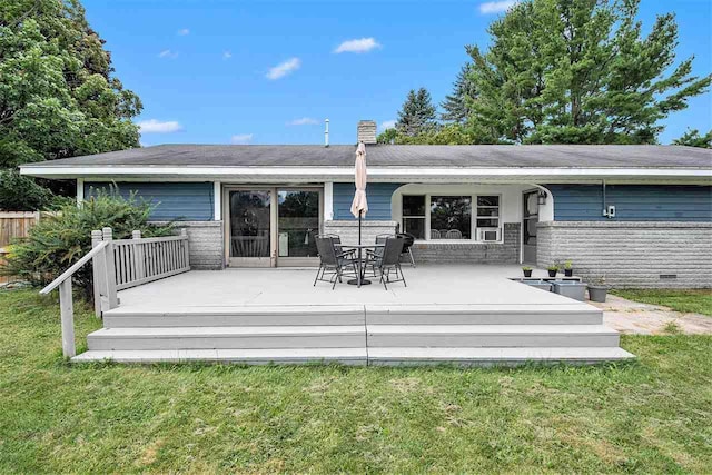 11601 Sequanota Heights Dr, Charlevoix, MI 49720 - rear view of property with a lawn, a deck, and a chimney