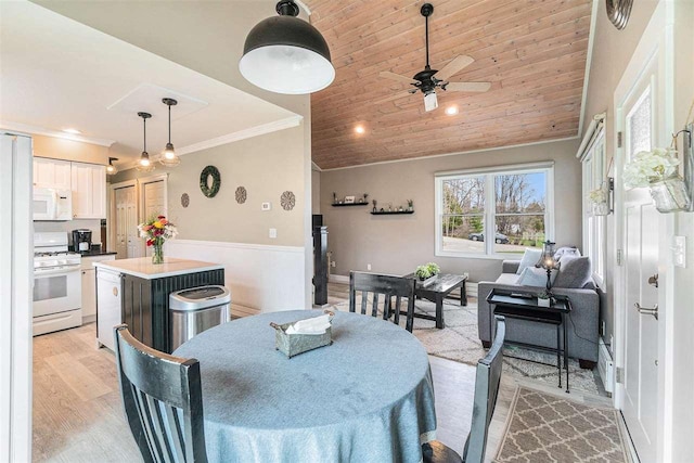 dining room with ceiling fan, wooden ceiling, ornamental molding, recessed lighting, and light wood-style flooring