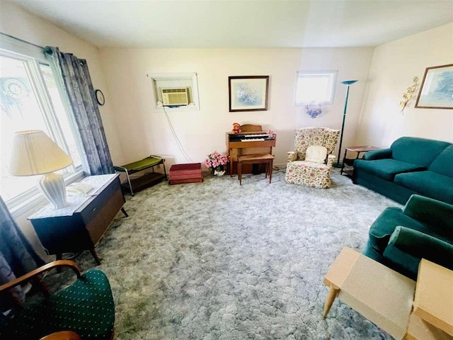 living area with carpet flooring and an AC wall unit