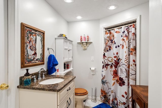 full bathroom with vanity, tile patterned floors, toilet, and a shower with shower curtain