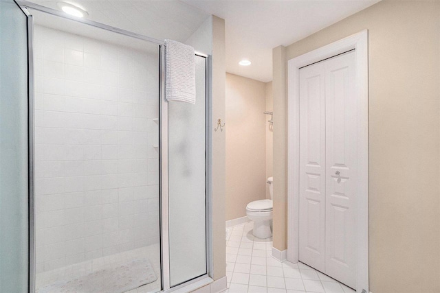 full bath with recessed lighting, tile patterned floors, a stall shower, and toilet