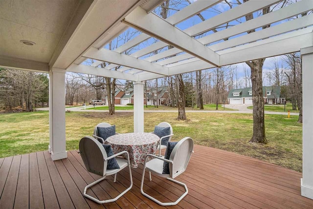 wooden terrace featuring a lawn, a pergola, and a residential view