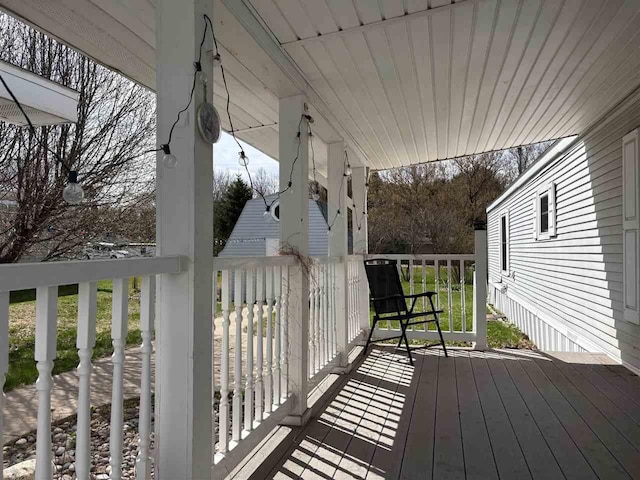 wooden deck with a porch