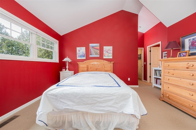 bedroom with carpet floors, baseboards, visible vents, and high vaulted ceiling