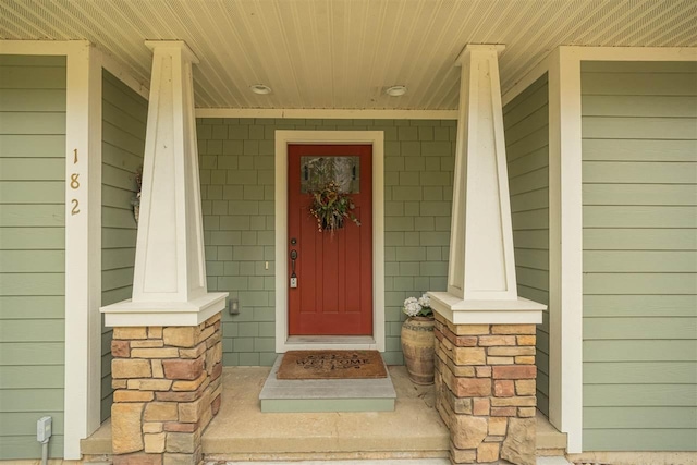 doorway to property with covered porch