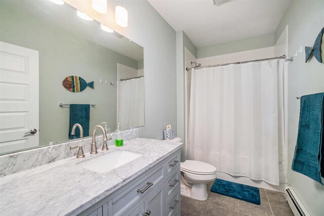 full bathroom with tile patterned flooring, vanity, toilet, shower / tub combo, and a baseboard heating unit
