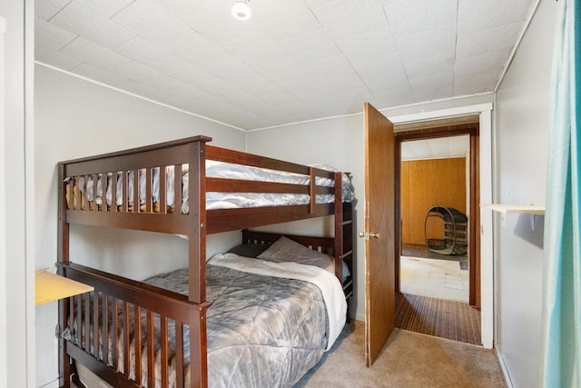 bedroom featuring carpet floors and ornamental molding