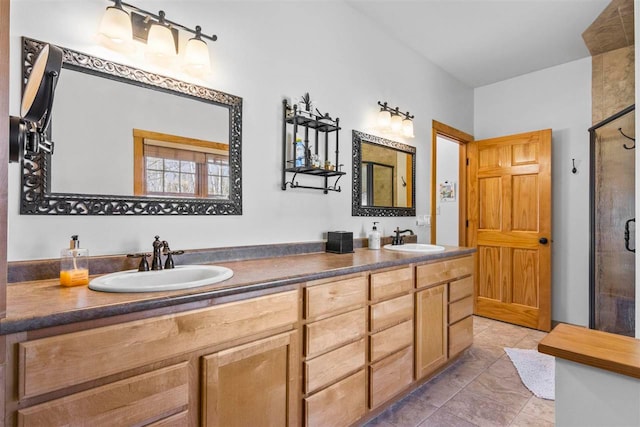 full bathroom featuring double vanity, a sink, tile patterned flooring, and a stall shower