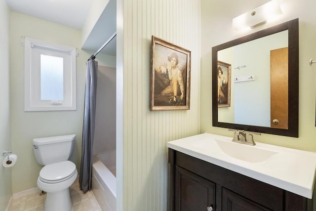 204 Winfield Ave, Petoskey, MI 49770 - bathroom featuring shower / tub combo with curtain, vanity, toilet, tile patterned floors, and baseboards