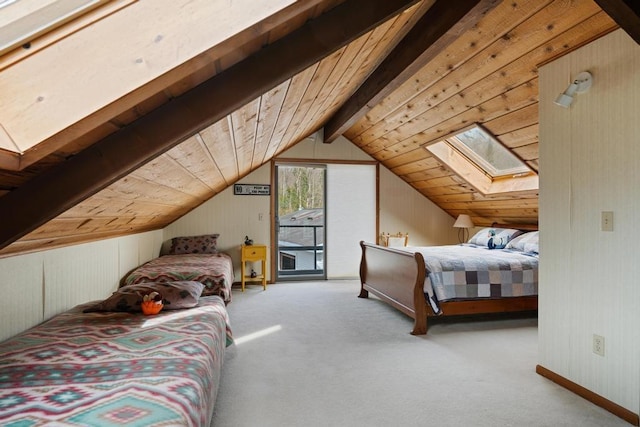 bedroom featuring carpet floors, wood walls, access to outside, wood ceiling, and vaulted ceiling with skylight