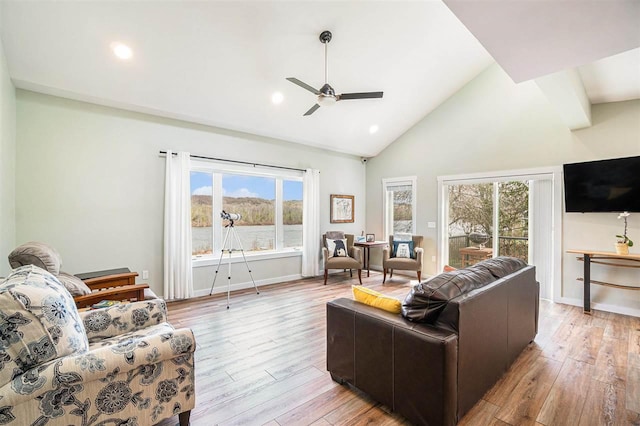 4852 Six Mile Lake Rd, Ellsworth, MI 49729 - living room featuring a ceiling fan, high vaulted ceiling, baseboards, light wood-style floors, and recessed lighting