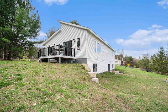 4852 Six Mile Lake Rd, Ellsworth, MI 49729 - view of side of property featuring a yard and a deck
