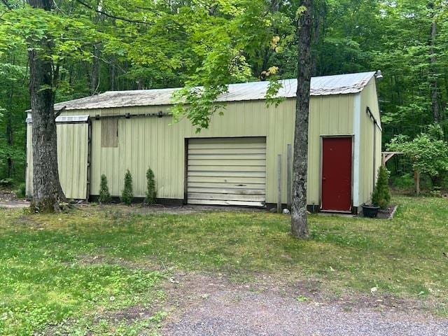 8118 E Mitchell St, Petoskey, MI 49770 - view of outbuilding with a forest view
