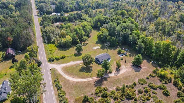 7906 Ferry Rd, East Jordan, MI 49727 - bird's eye view featuring a view of trees