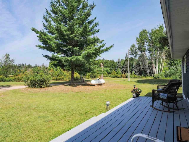7906 Ferry Rd, East Jordan, MI 49727 - deck with a yard