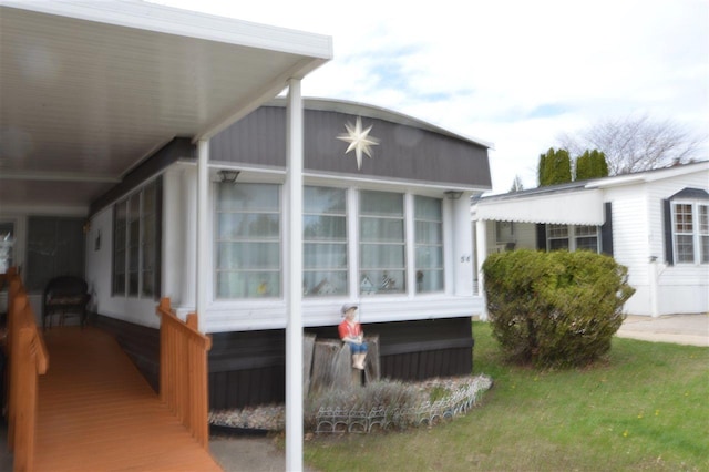 view of home's exterior featuring a sunroom