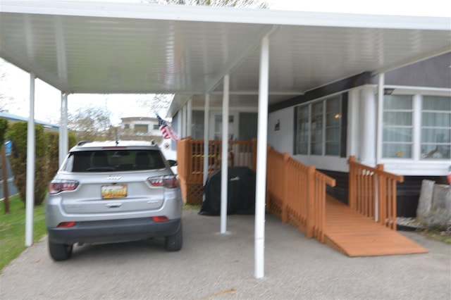 view of car parking featuring a carport