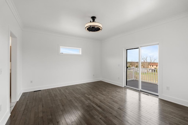 358 Harbor View Ln, Petoskey, MI 49770 - spare room featuring ornamental molding, a healthy amount of sunlight, and dark wood-type flooring