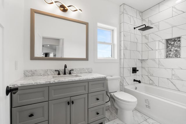 358 Harbor View Ln, Petoskey, MI 49770 - bathroom featuring toilet, marble finish floor, vanity, and  shower combination