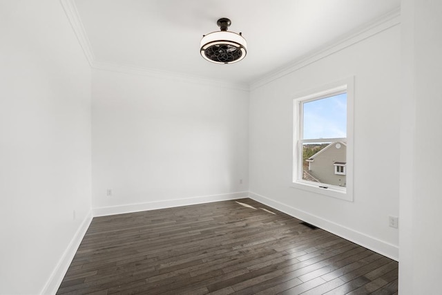 358 Harbor View Ln, Petoskey, MI 49770 - unfurnished room with crown molding, dark wood-style flooring, and baseboards
