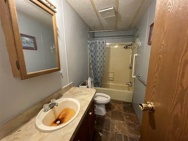 full bath with toilet, vanity, shower / bath combination with curtain, and a textured ceiling