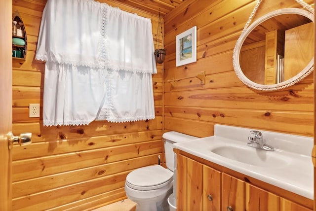 14786 Nuenfelt Rd, Johannesburg, MI 49756 - bathroom with wooden walls, toilet, vanity, and wooden ceiling