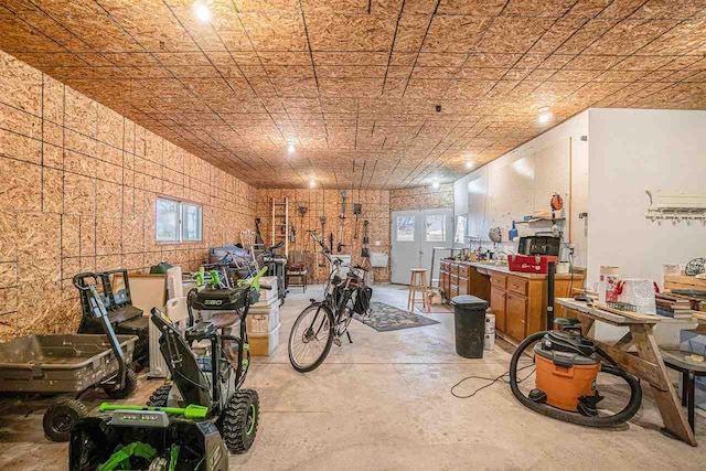 110 Hillcrest, East Jordan, MI 49727 - miscellaneous room featuring concrete flooring