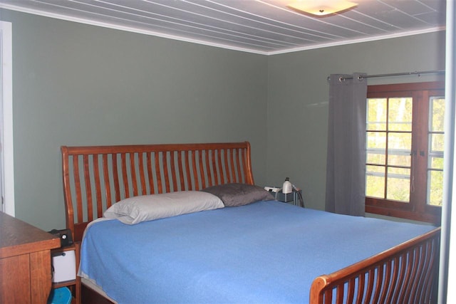 bedroom with ornamental molding