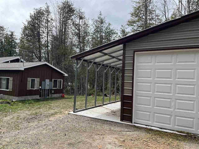garage featuring driveway
