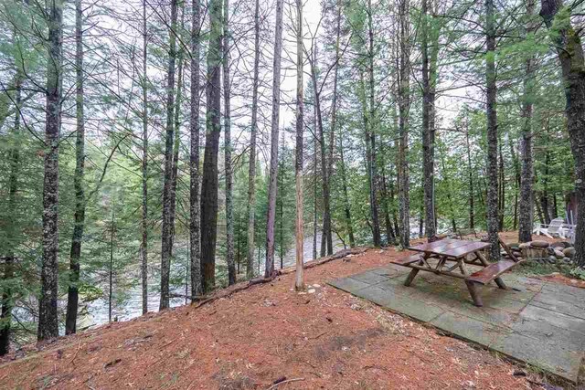 view of patio featuring a forest view