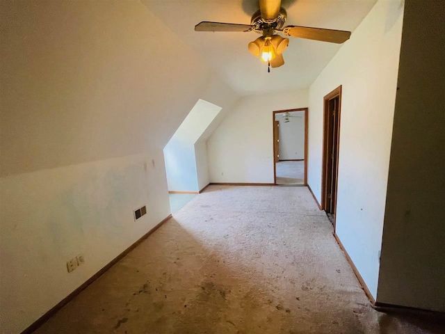 204 E Forest Home Ave, Bellaire, MI 49615 - bonus room featuring carpet floors, a ceiling fan, vaulted ceiling, and baseboards